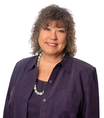 Portrait of Jeanne Wolfe, REALTOR®.